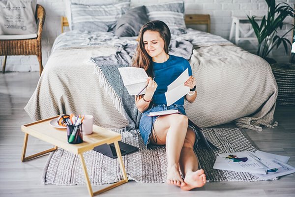 A first time homebuyer looking at her finances to see where to start saving for a down payment