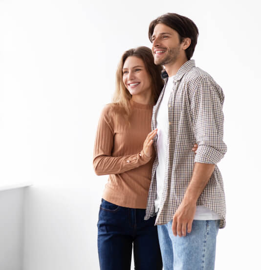 First time homebuyers admiring their new home