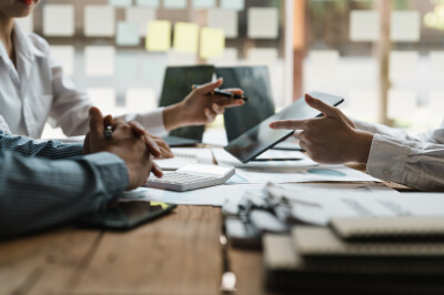 Couple learns what a loan officer is during meeting with mortgage lender.