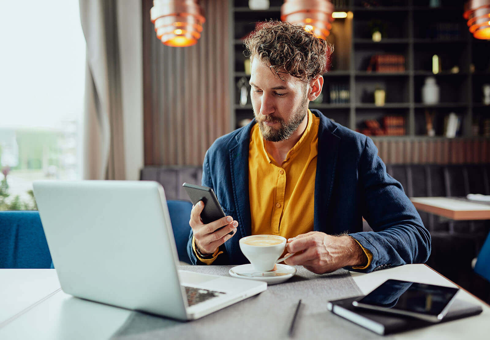 A man on his laptop watching educational mortgage videos