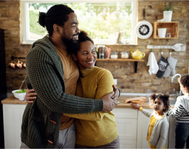 Homeowners in their new kitchen